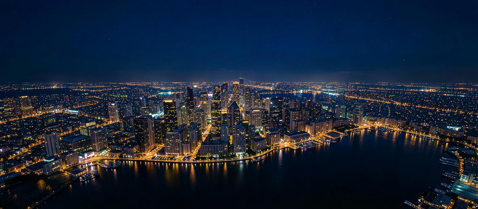 Global city skyline lit at night